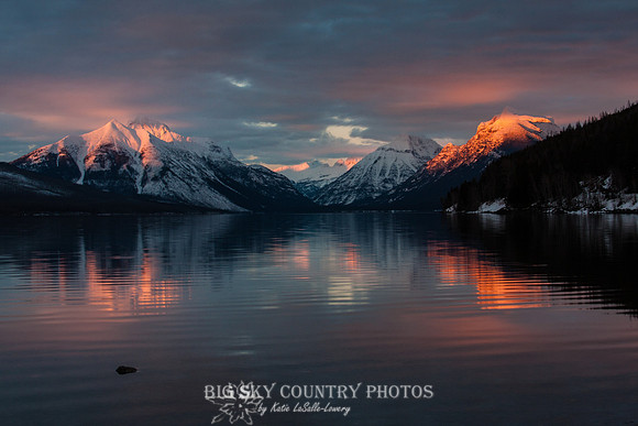 alpenglow on Stanton Mountain, Mount Vaught, Mount Grown and Little Matterhorn - viewed from the foot of Lake McDonald - Glacier National Park